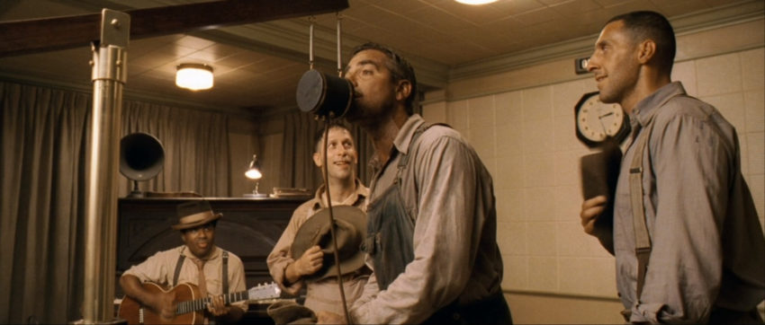 Four men in a 1930s recording studio, still from O Brother Where Art Thou