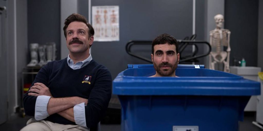 Jason Sudeikis as Ted Lasso and Brett Goldstein as Roy Kent in the show Ted Lasso